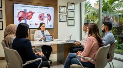 An oncologist discussing cancer treatment costs and options with a diverse group of patients in Mexico.
