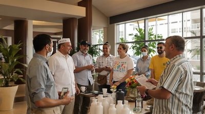 International dental tourists in Cancun hotel lobby receiving travel coordination services