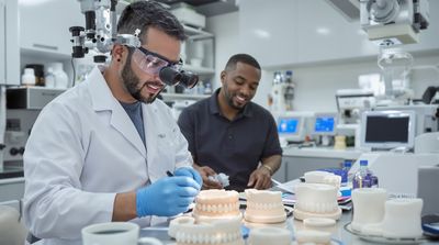 Mexican cosmetic dentist creating porcelain veneers for diverse American patients.