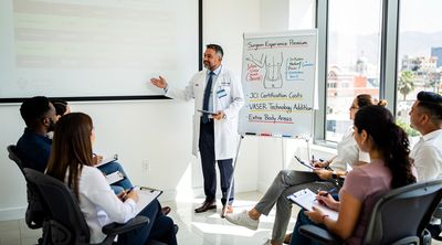 Plastic surgeon explains Lipo 360 cost factors to diverse patients in Tijuana.